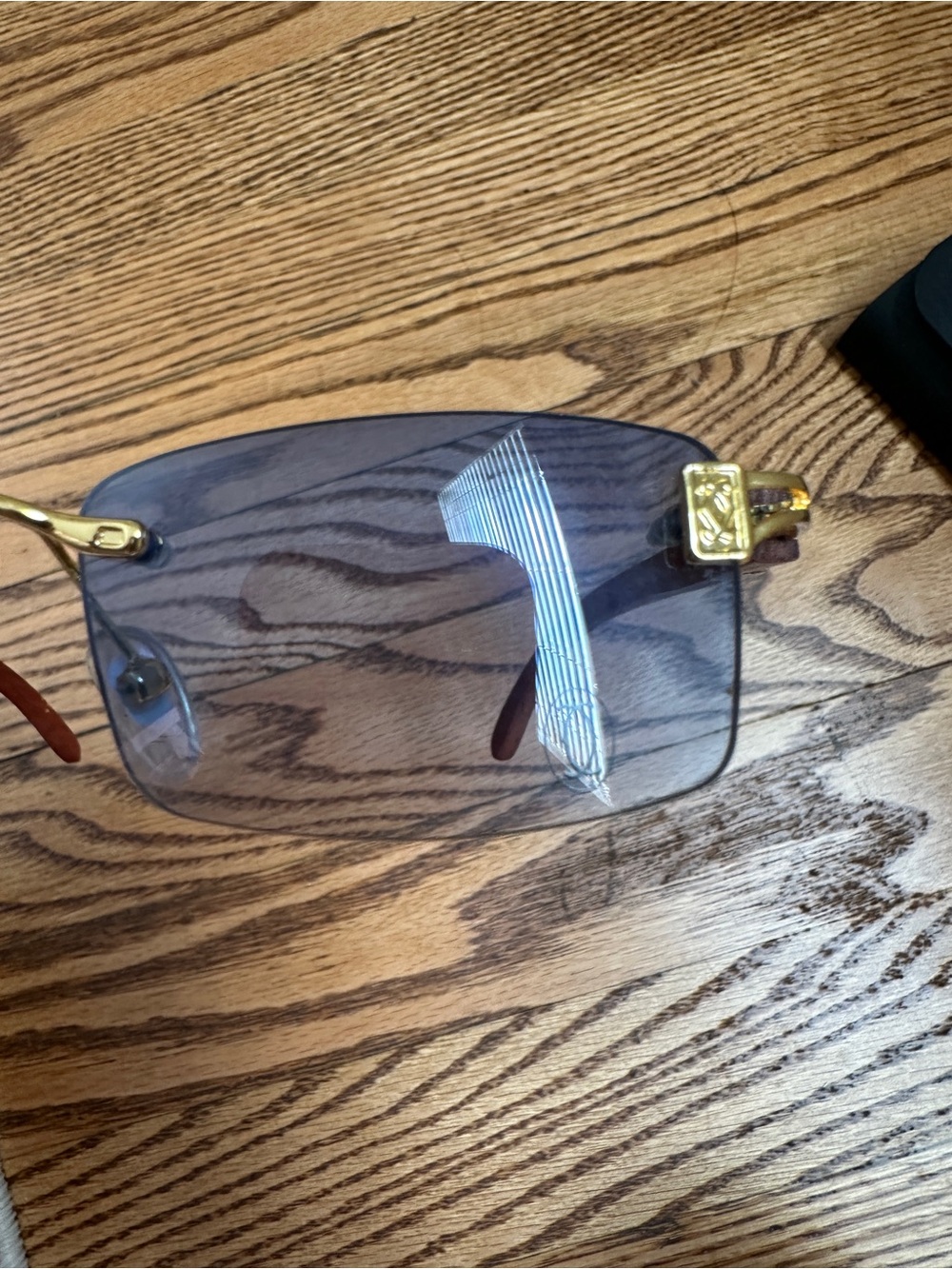 Cartier Rimless Sunglasses with Blue Gradient Lenses and Gold Accents - Picture 11 of 14